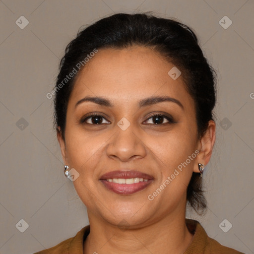 Joyful latino young-adult female with medium  brown hair and brown eyes