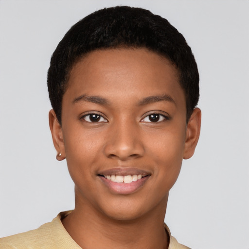 Joyful black young-adult male with short  brown hair and brown eyes