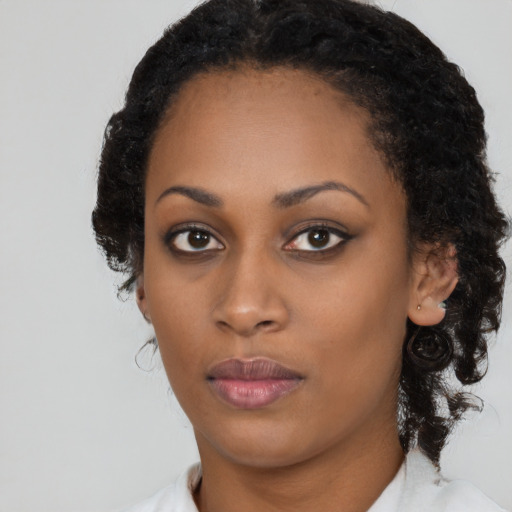 Neutral black young-adult female with long  black hair and brown eyes