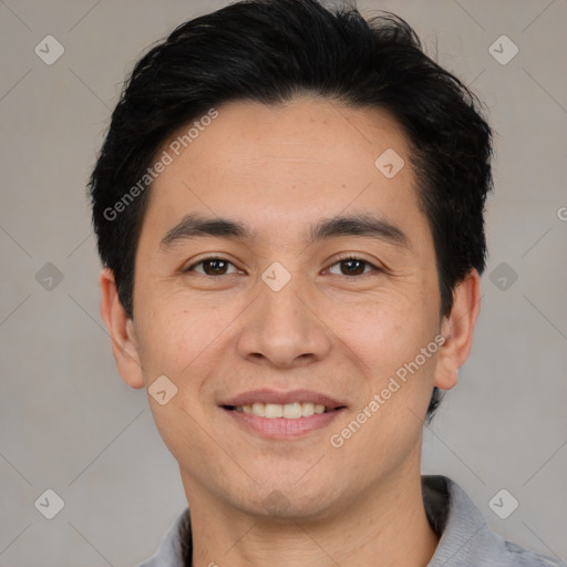 Joyful white young-adult male with short  black hair and brown eyes