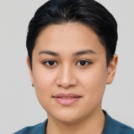 Joyful asian young-adult female with short  brown hair and brown eyes
