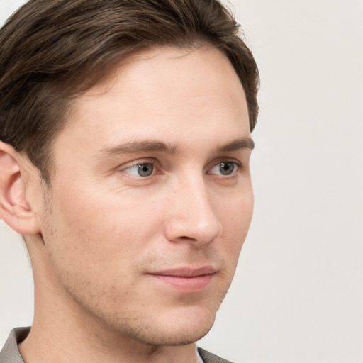 Neutral white young-adult male with short  brown hair and grey eyes