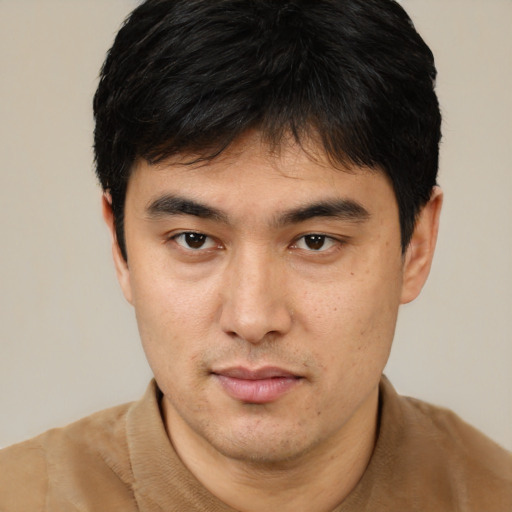 Neutral asian young-adult male with short  brown hair and brown eyes