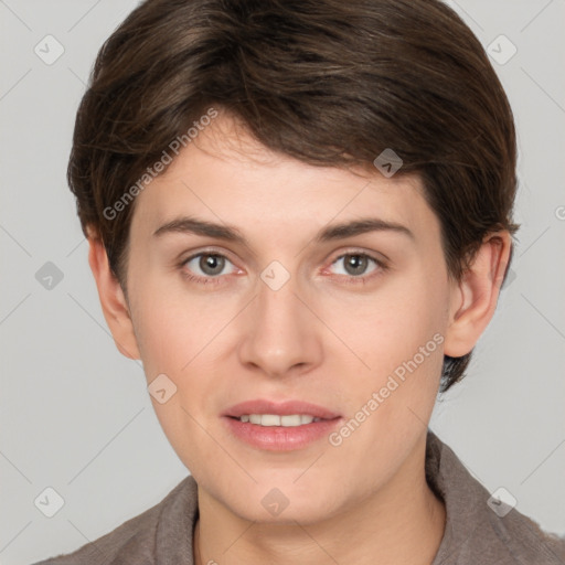 Joyful white young-adult female with short  brown hair and brown eyes