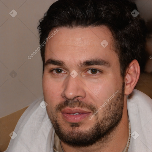 Joyful white young-adult male with short  brown hair and brown eyes