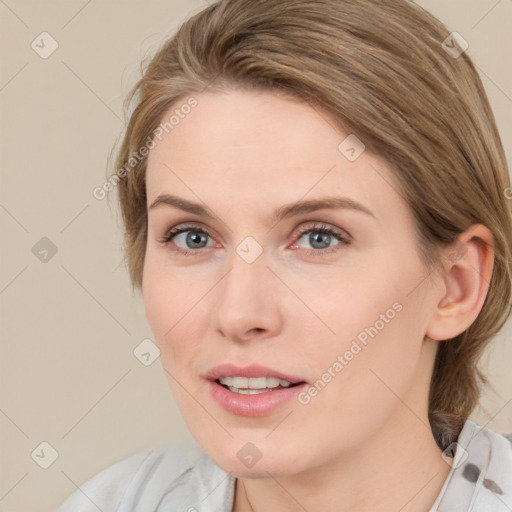 Joyful white young-adult female with medium  brown hair and blue eyes