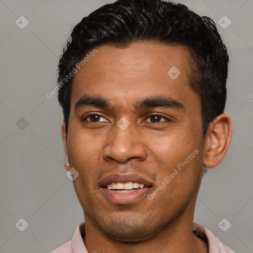 Joyful latino young-adult male with short  black hair and brown eyes