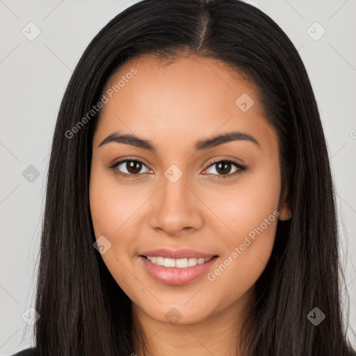 Joyful latino young-adult female with long  brown hair and brown eyes
