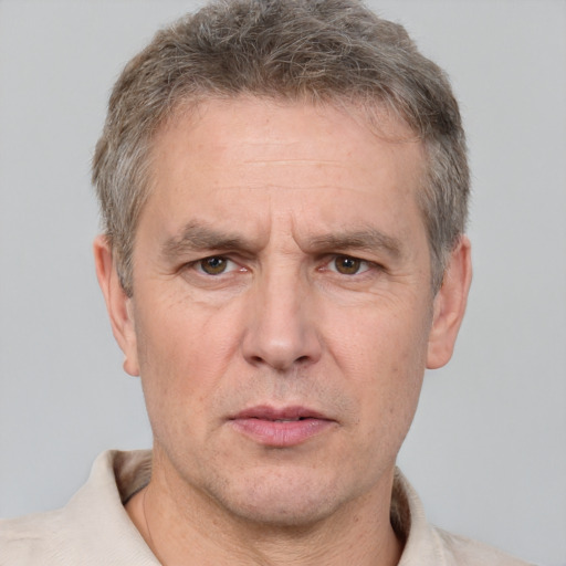 Neutral white adult male with short  brown hair and grey eyes