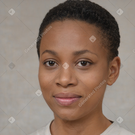 Joyful black young-adult female with short  brown hair and brown eyes