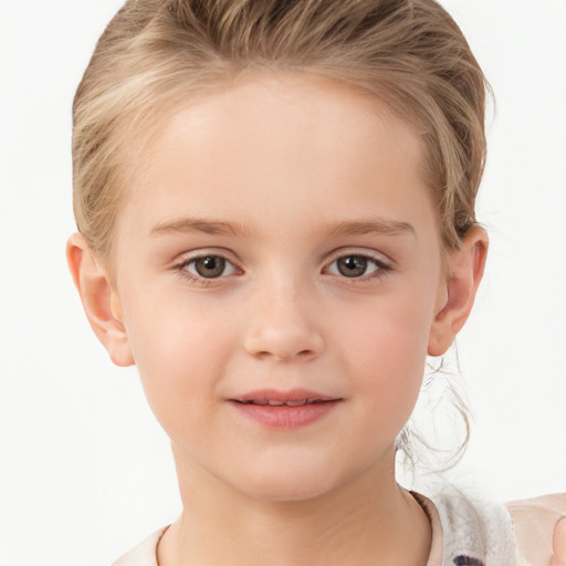 Joyful white child female with medium  blond hair and brown eyes