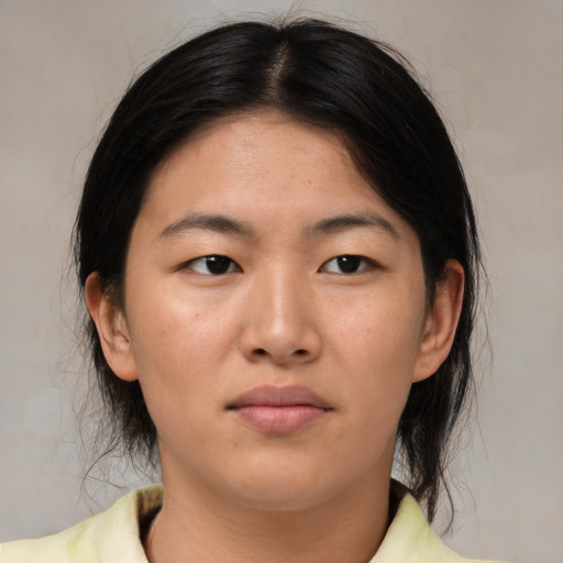 Neutral asian young-adult female with medium  brown hair and brown eyes