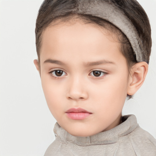 Neutral white child female with short  brown hair and brown eyes