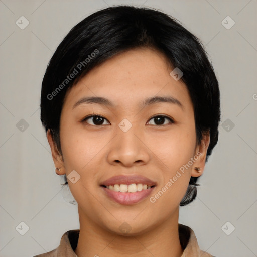 Joyful asian young-adult female with medium  black hair and brown eyes