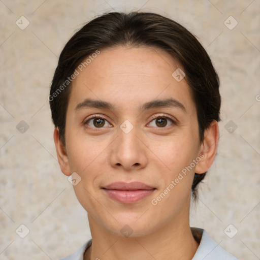 Joyful white young-adult female with short  brown hair and brown eyes