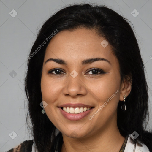 Joyful latino young-adult female with long  brown hair and brown eyes