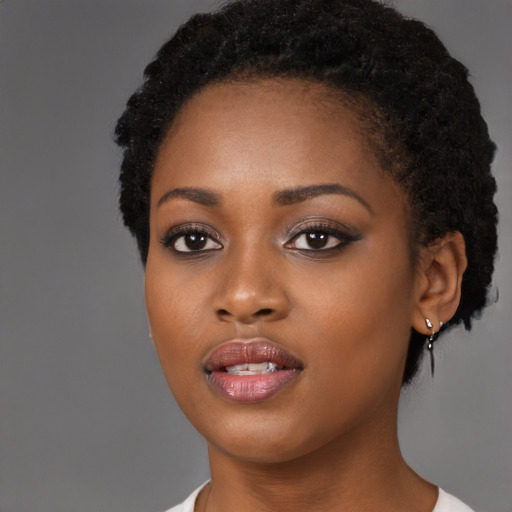 Neutral black young-adult female with short  black hair and brown eyes