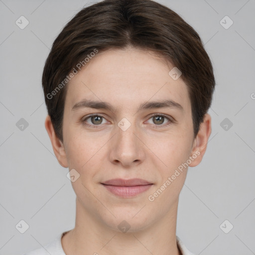 Joyful white young-adult female with short  brown hair and grey eyes