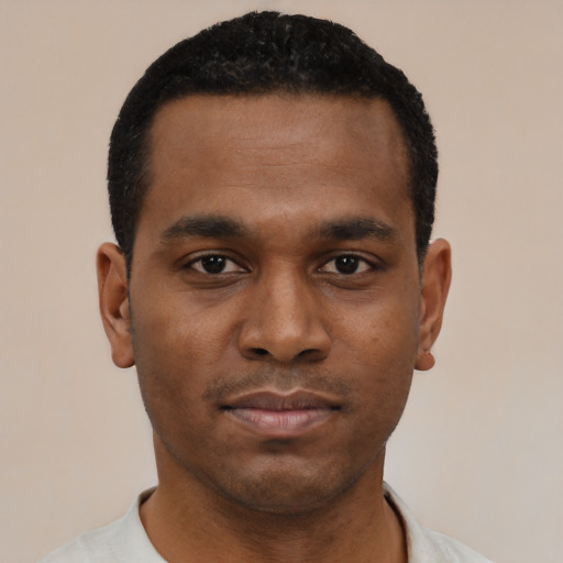 Neutral black young-adult male with short  black hair and brown eyes