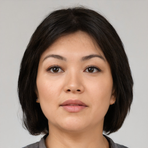 Neutral asian young-adult female with medium  black hair and brown eyes