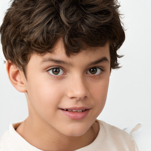 Joyful white child male with short  brown hair and brown eyes