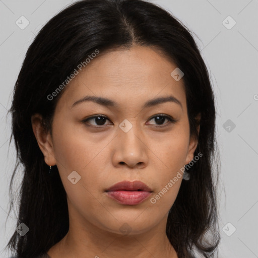 Joyful asian young-adult female with long  brown hair and brown eyes