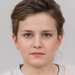 Neutral white child female with short  brown hair and grey eyes