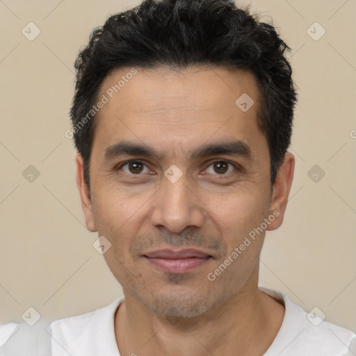 Joyful white adult male with short  black hair and brown eyes