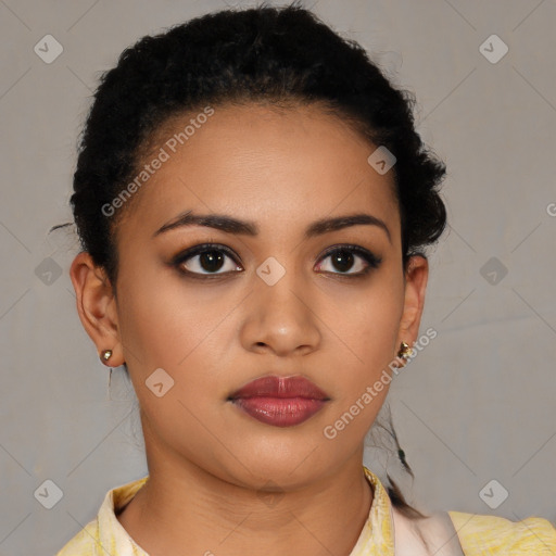 Joyful latino young-adult female with short  black hair and brown eyes