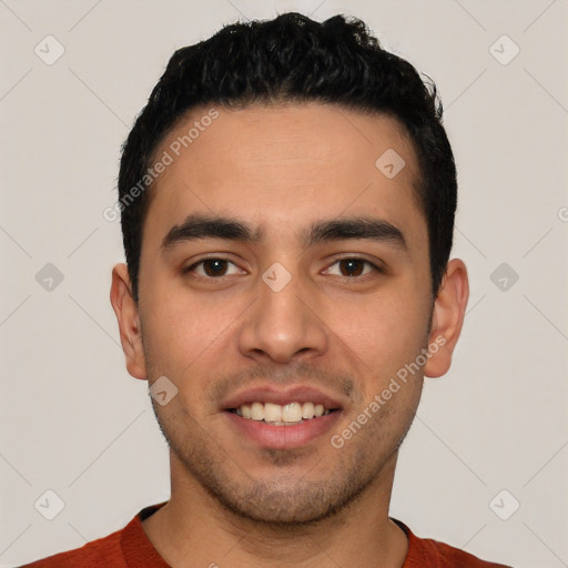 Joyful white young-adult male with short  black hair and brown eyes