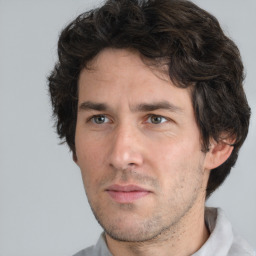 Neutral white adult male with short  brown hair and brown eyes