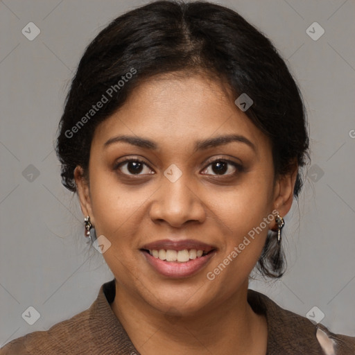 Joyful black young-adult female with medium  brown hair and brown eyes