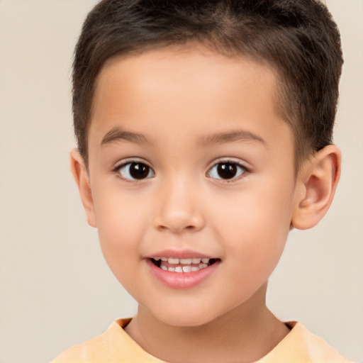 Joyful white child male with short  brown hair and brown eyes