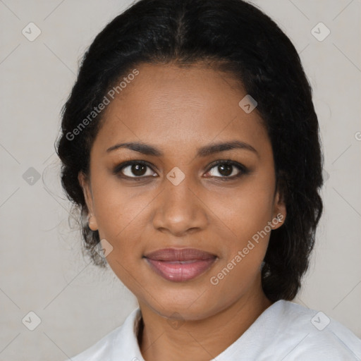 Joyful black adult female with medium  brown hair and brown eyes