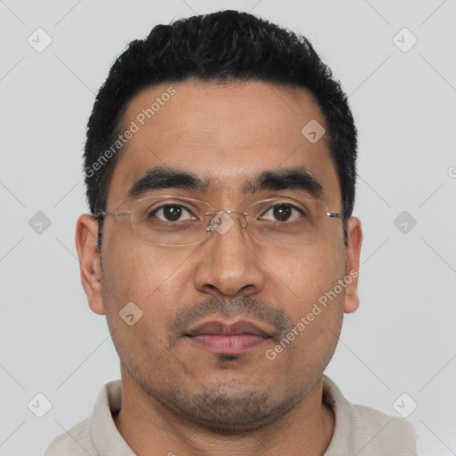 Neutral latino young-adult male with short  black hair and brown eyes