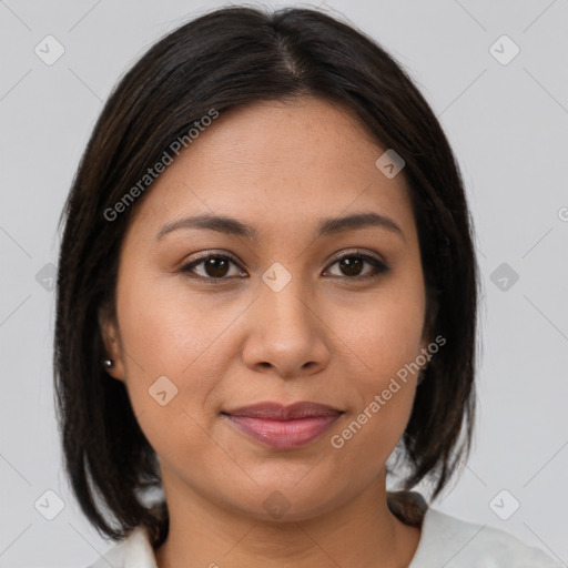 Joyful asian young-adult female with medium  brown hair and brown eyes