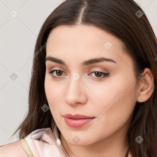 Neutral white young-adult female with long  brown hair and brown eyes