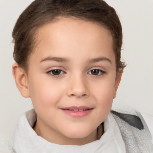 Joyful white child female with short  brown hair and brown eyes