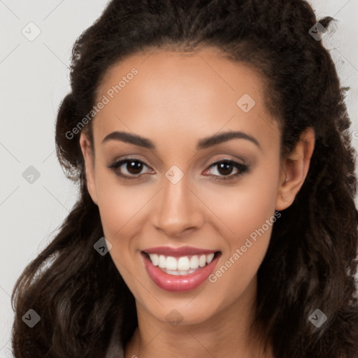 Joyful latino young-adult female with long  brown hair and brown eyes