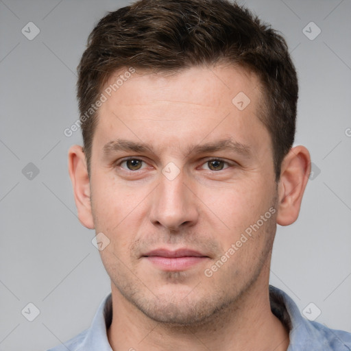 Neutral white young-adult male with short  brown hair and grey eyes