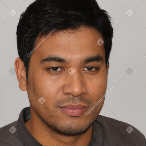 Neutral latino young-adult male with short  brown hair and brown eyes