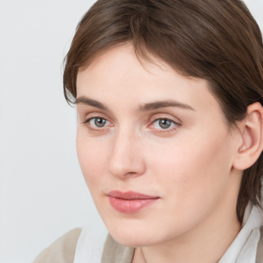 Neutral white young-adult female with medium  brown hair and grey eyes