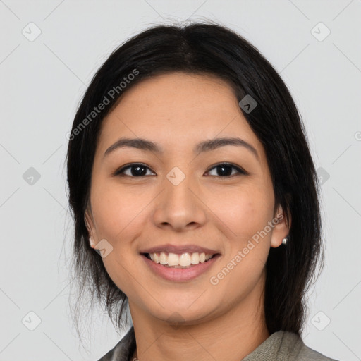 Joyful asian young-adult female with medium  black hair and brown eyes