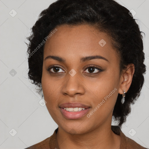 Joyful black young-adult female with medium  black hair and brown eyes