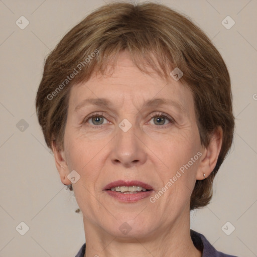 Joyful white adult female with medium  brown hair and grey eyes