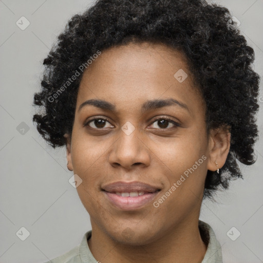 Joyful black young-adult female with short  black hair and brown eyes