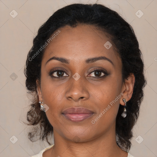 Joyful black young-adult female with medium  brown hair and brown eyes