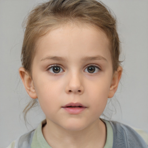 Neutral white child female with medium  brown hair and brown eyes