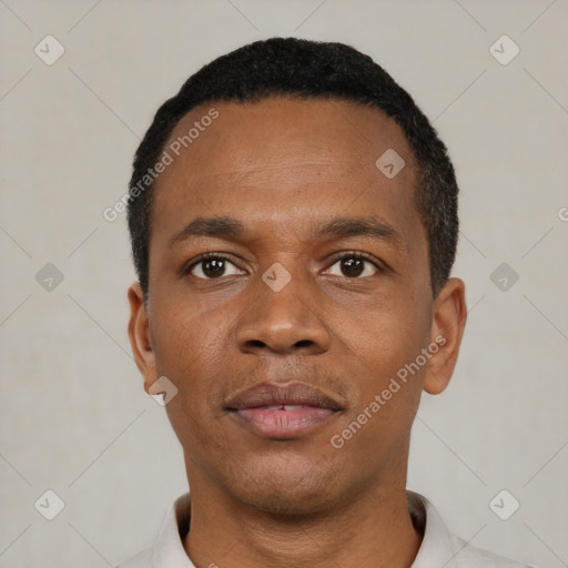 Neutral black young-adult male with short  black hair and brown eyes