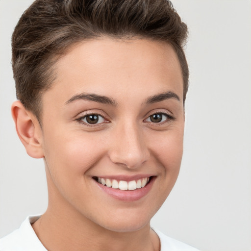 Joyful white young-adult female with short  brown hair and brown eyes